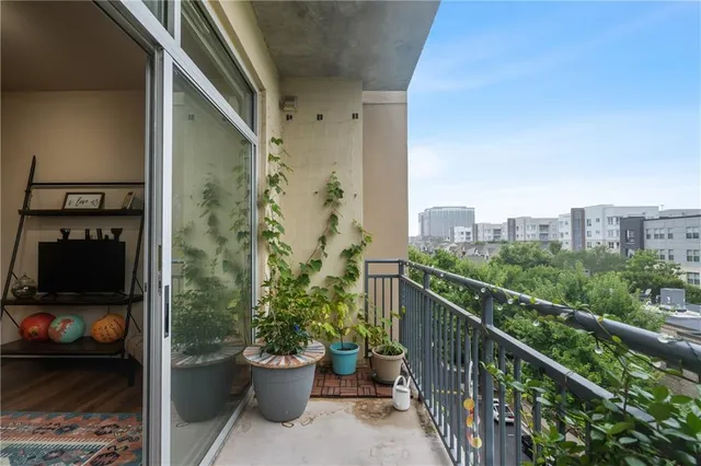 a view of a balcony with an outdoor space