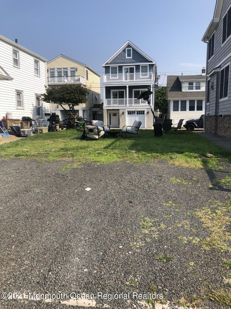 16 Via Ripa Sea Bright, NJ 07760 - Photo 2 of 5 a front view of a house with a yard