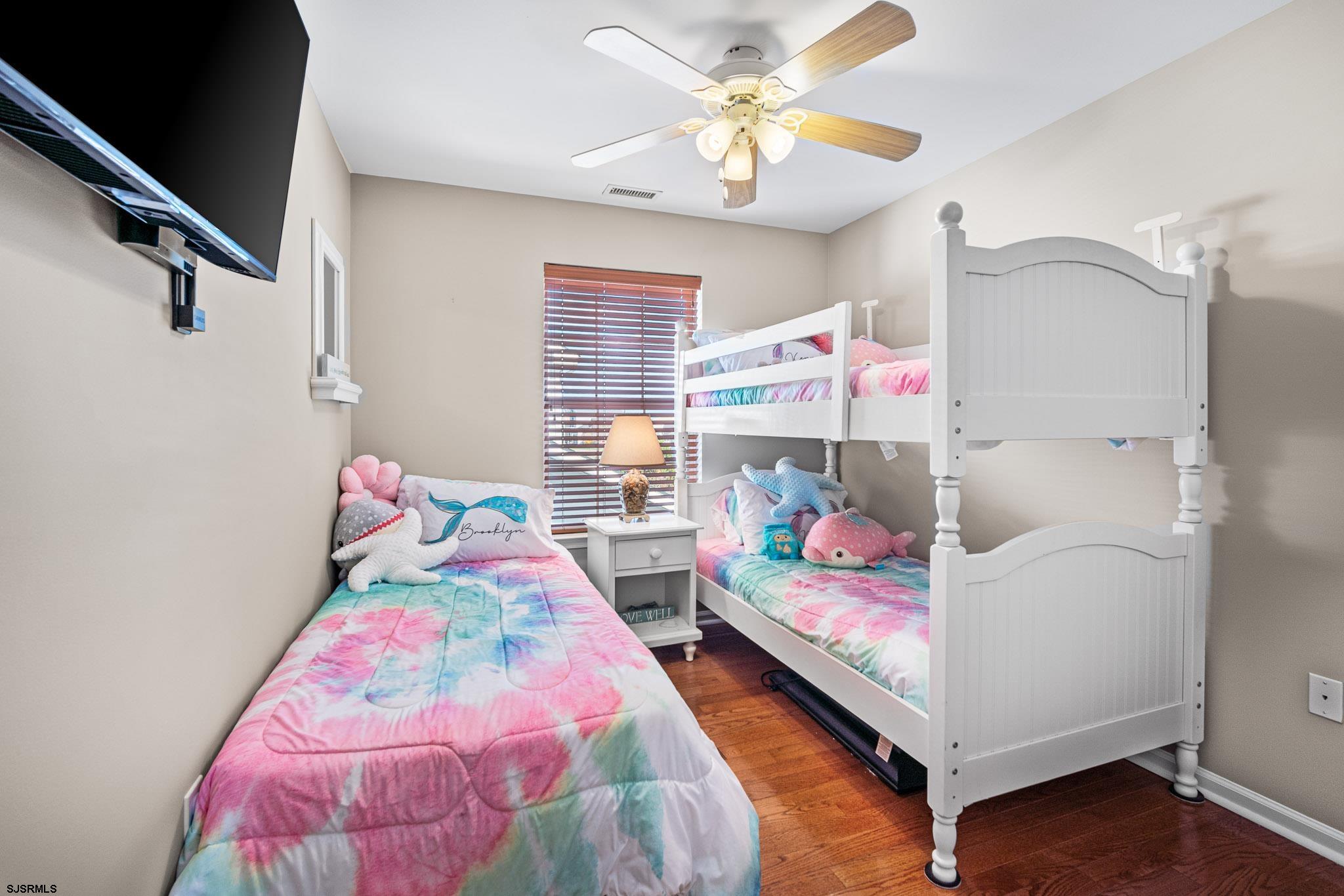 5 Collette Circle Brigantine, NJ 08203 - Photo 17 of 36 a bedroom with furniture and a baby crib