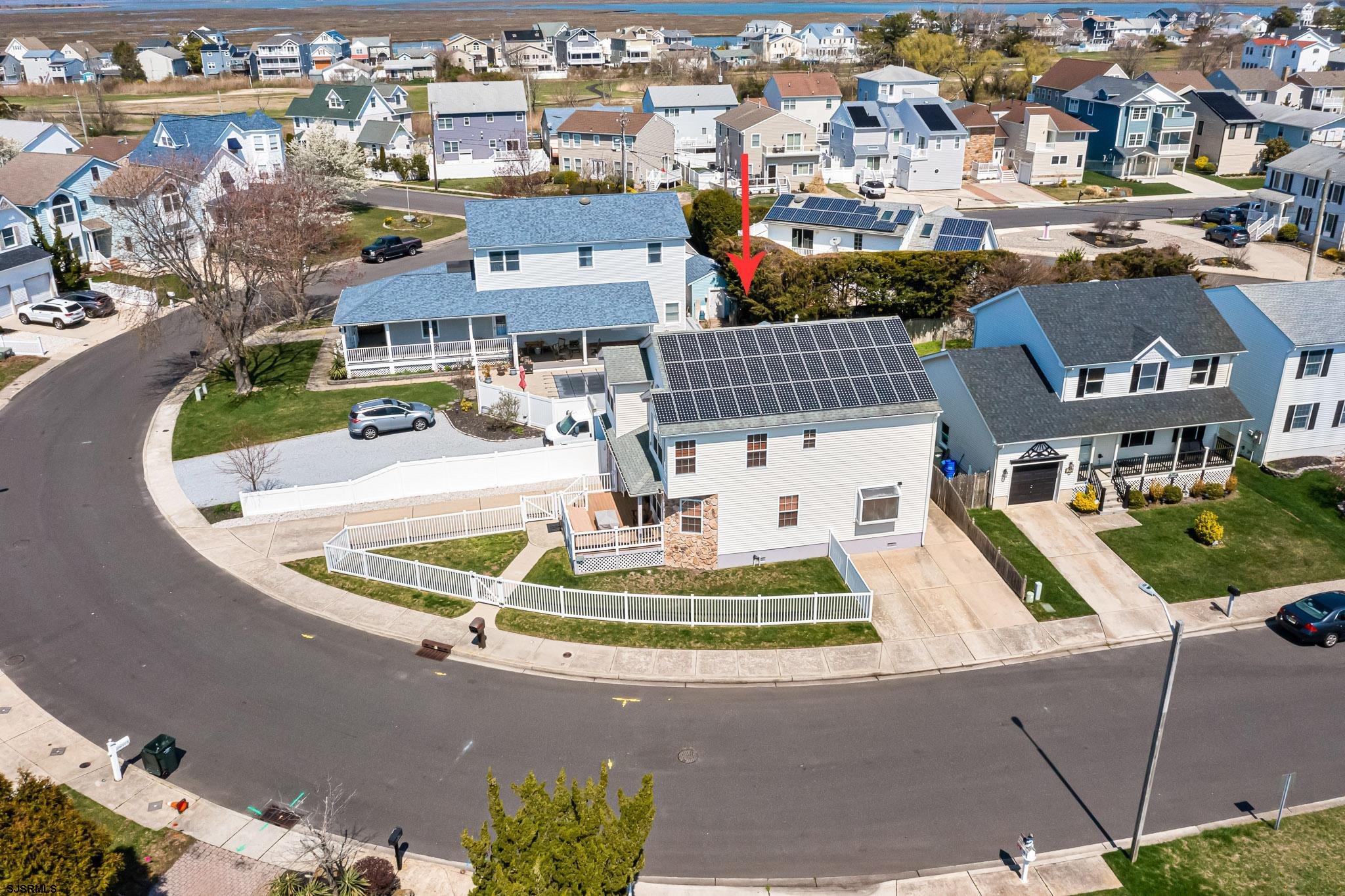 5 Collette Circle Brigantine, NJ 08203 - Photo 28 of 36 a view of multiple houses with a swimming pool