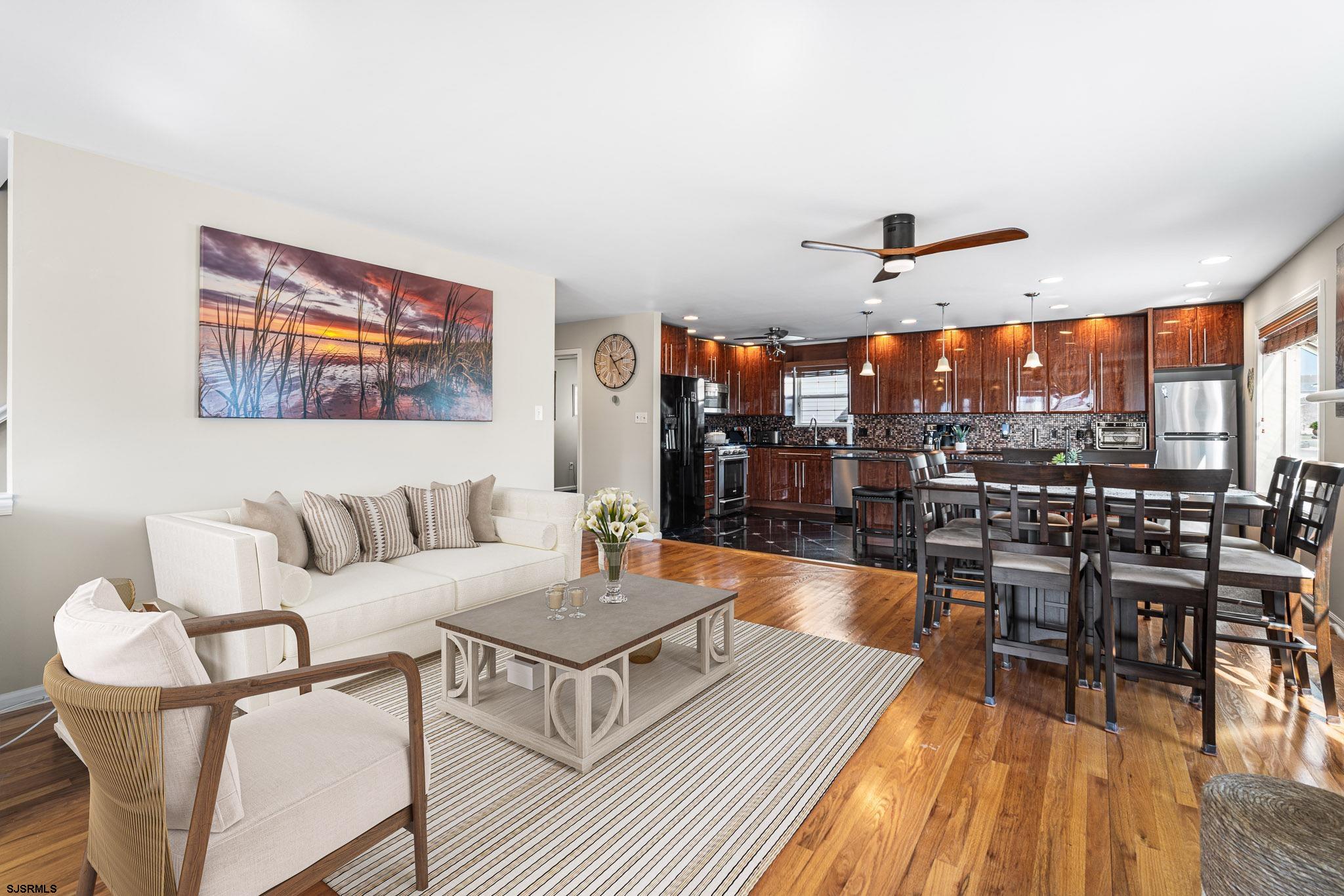 5 Collette Circle Brigantine, NJ 08203 - Photo 6 of 36 a living room with furniture and wooden floor