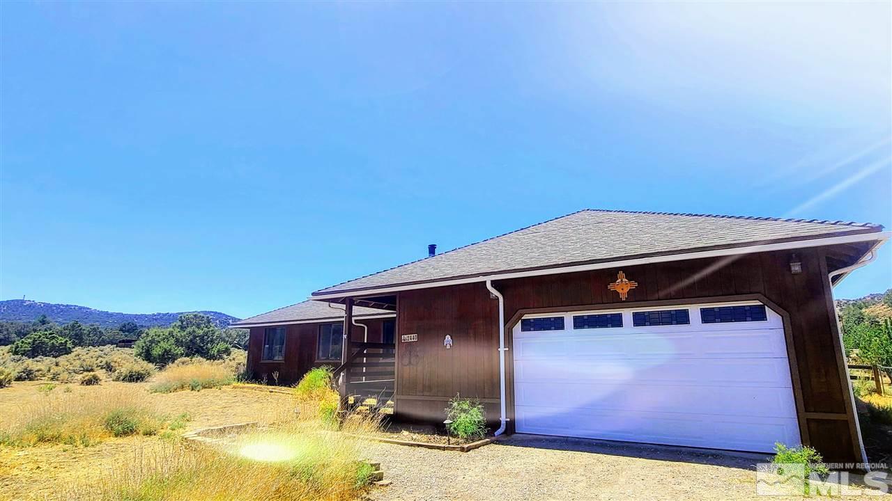 2440 Lousetown Road Reno, NV 89521 - Photo 1 of 20 a front view of a house with a yard