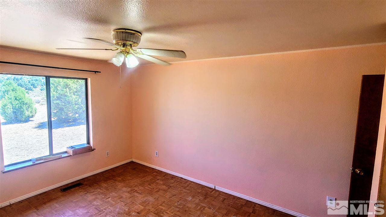 2440 Lousetown Road Reno, NV 89521 - Photo 16 of 20 an empty room with a window
