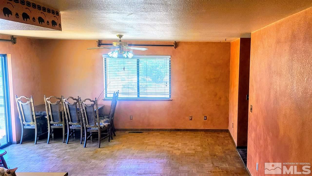2440 Lousetown Road Reno, NV 89521 - Photo 5 of 20 a view of workspace with furniture and window