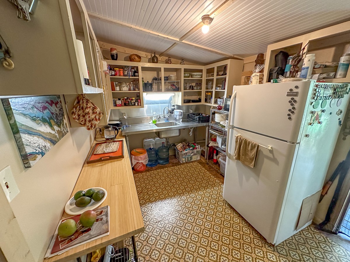 0 Fm 1374 Huntsville, TX 77340 - Photo 11 of 18 a living room with a couch and a table with wooden floor