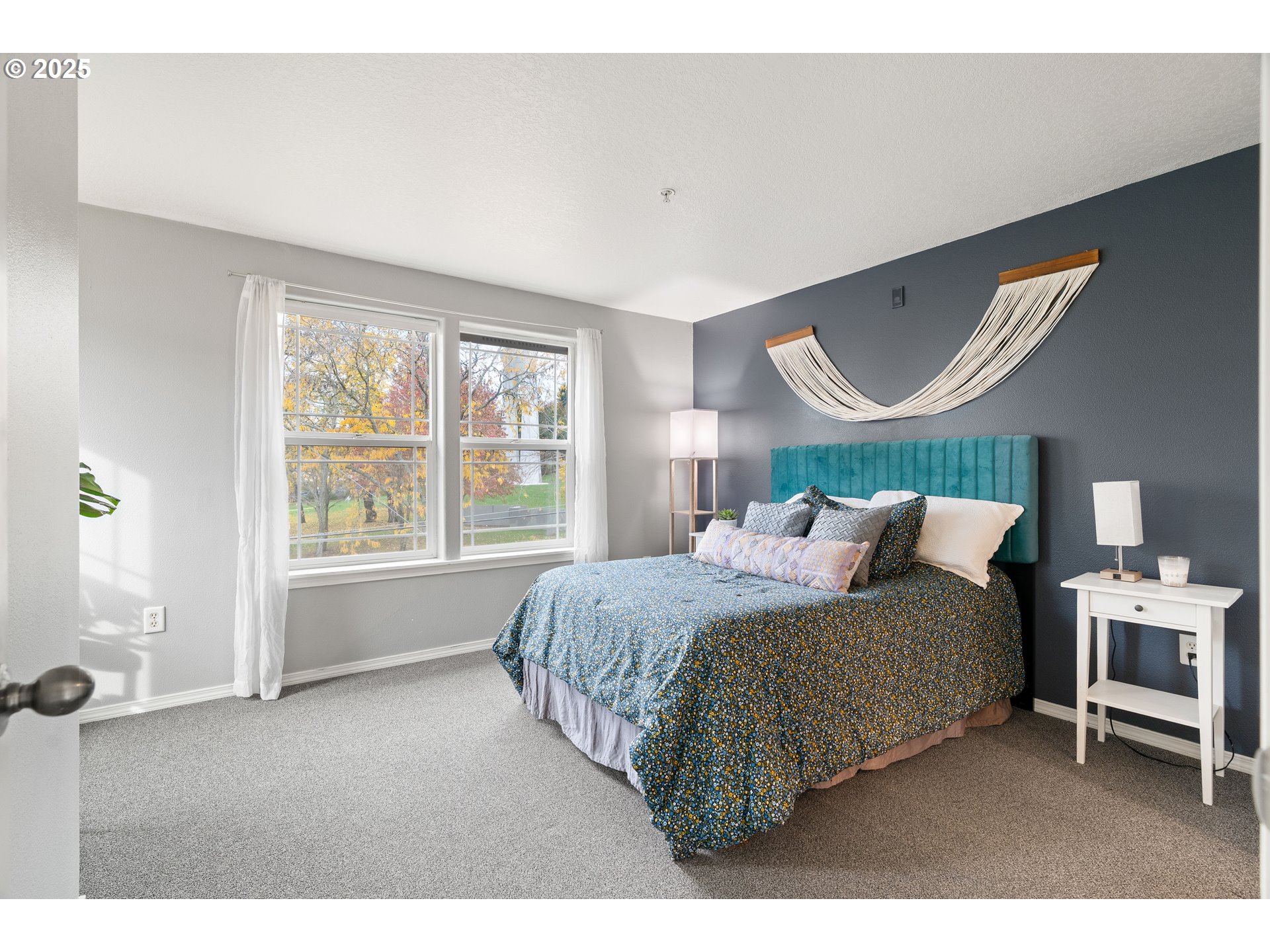 6700 North Pittsburg Avenue Portland, OR 97203 - Photo 16 of 29 a bedroom with a bed wooden floor and a window