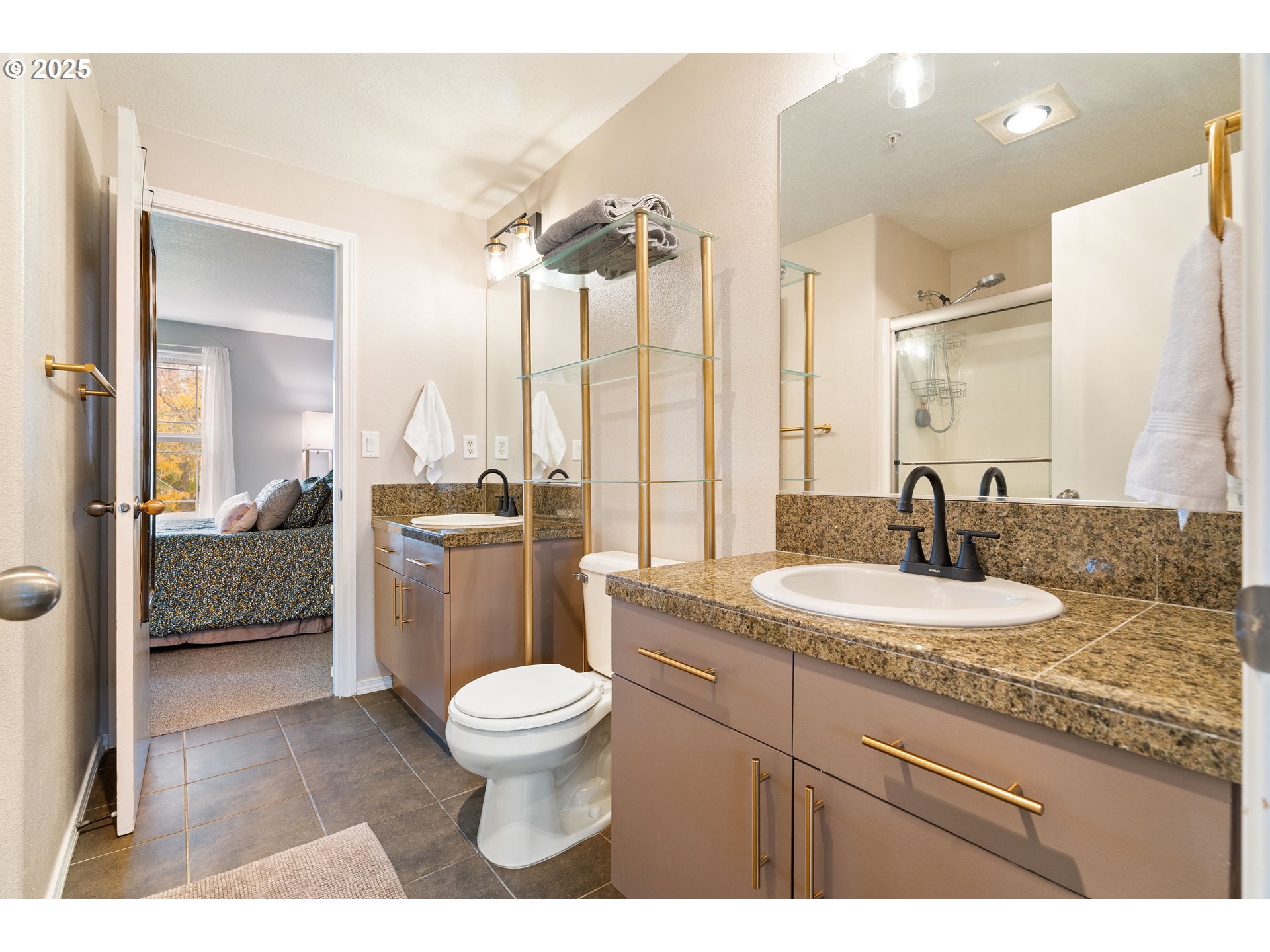 6700 North Pittsburg Avenue Portland, OR 97203 - Photo 19 of 29 a bathroom with a granite countertop sink mirror vanity and toilet