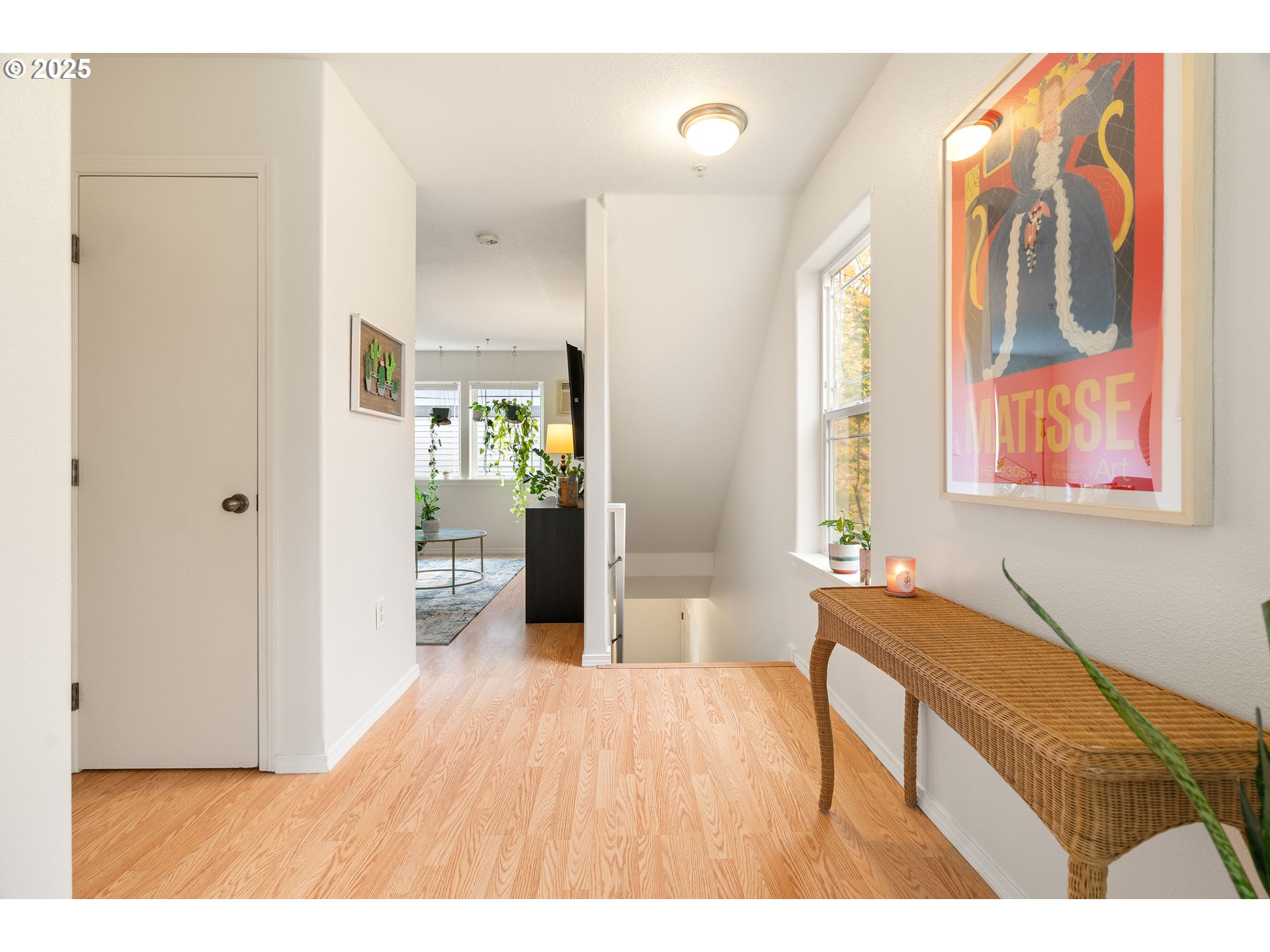 6700 North Pittsburg Avenue Portland, OR 97203 - Photo 9 of 29 a bedroom with a bed and wooden floor