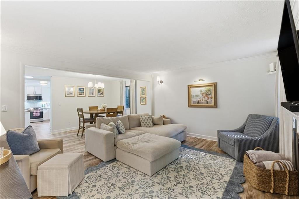 2907 Ironwood Road Southeast Marietta, GA 30067 - Photo 16 of 41 a living room with furniture and a flat screen tv