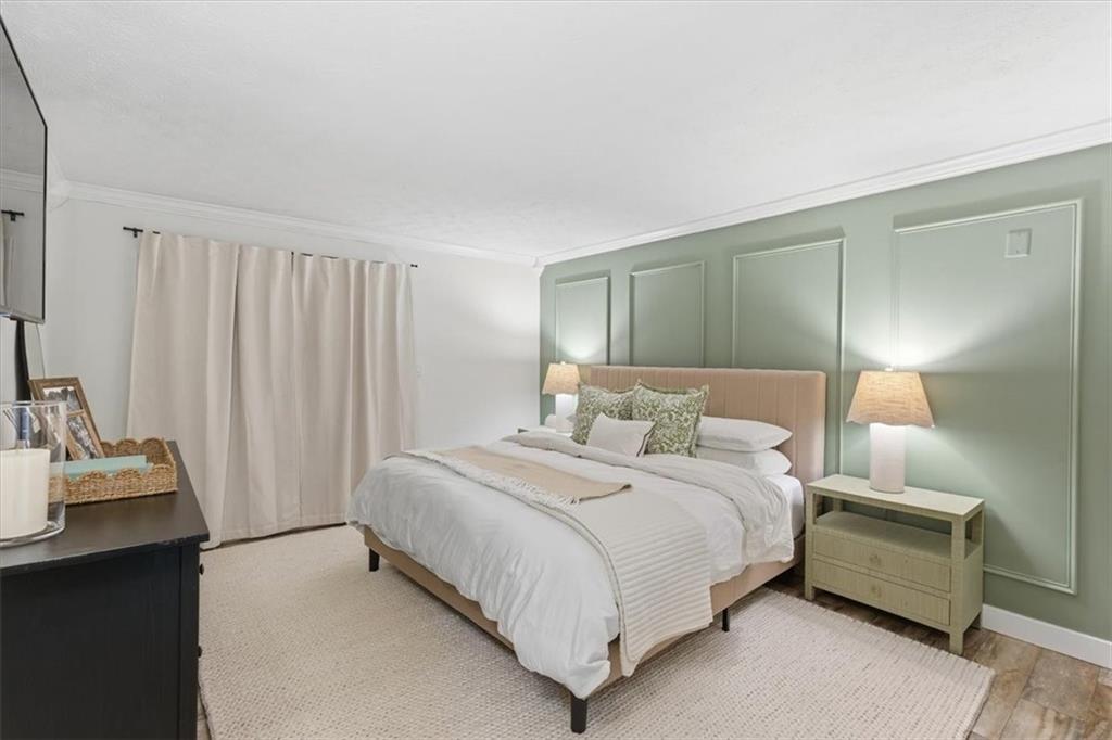 2907 Ironwood Road Southeast Marietta, GA 30067 - Photo 17 of 41 a bedroom with a bed and a mirror