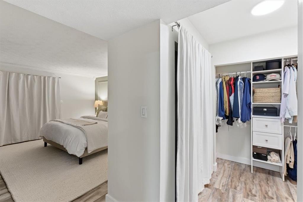 2907 Ironwood Road Southeast Marietta, GA 30067 - Photo 19 of 41 a walk in closet with view of bedroom
