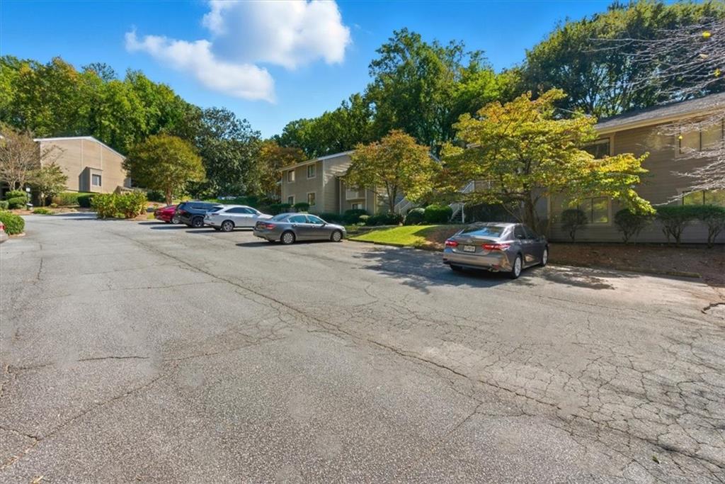 2907 Ironwood Road Southeast Marietta, GA 30067 - Photo 31 of 41 a view of car parked on the side of a road