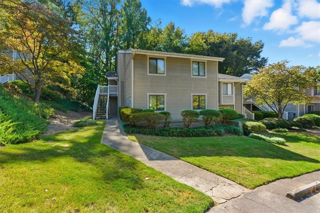 2907 Ironwood Road Southeast Marietta, GA 30067 - Photo 36 of 41 a front view of house with yard and green space