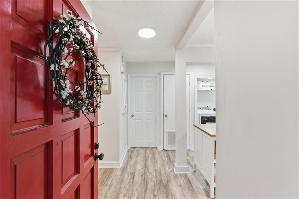 2907 Ironwood Road Southeast Marietta, GA 30067 - Photo 5 of 41 a view of entryway with a flower pot and wooden floor