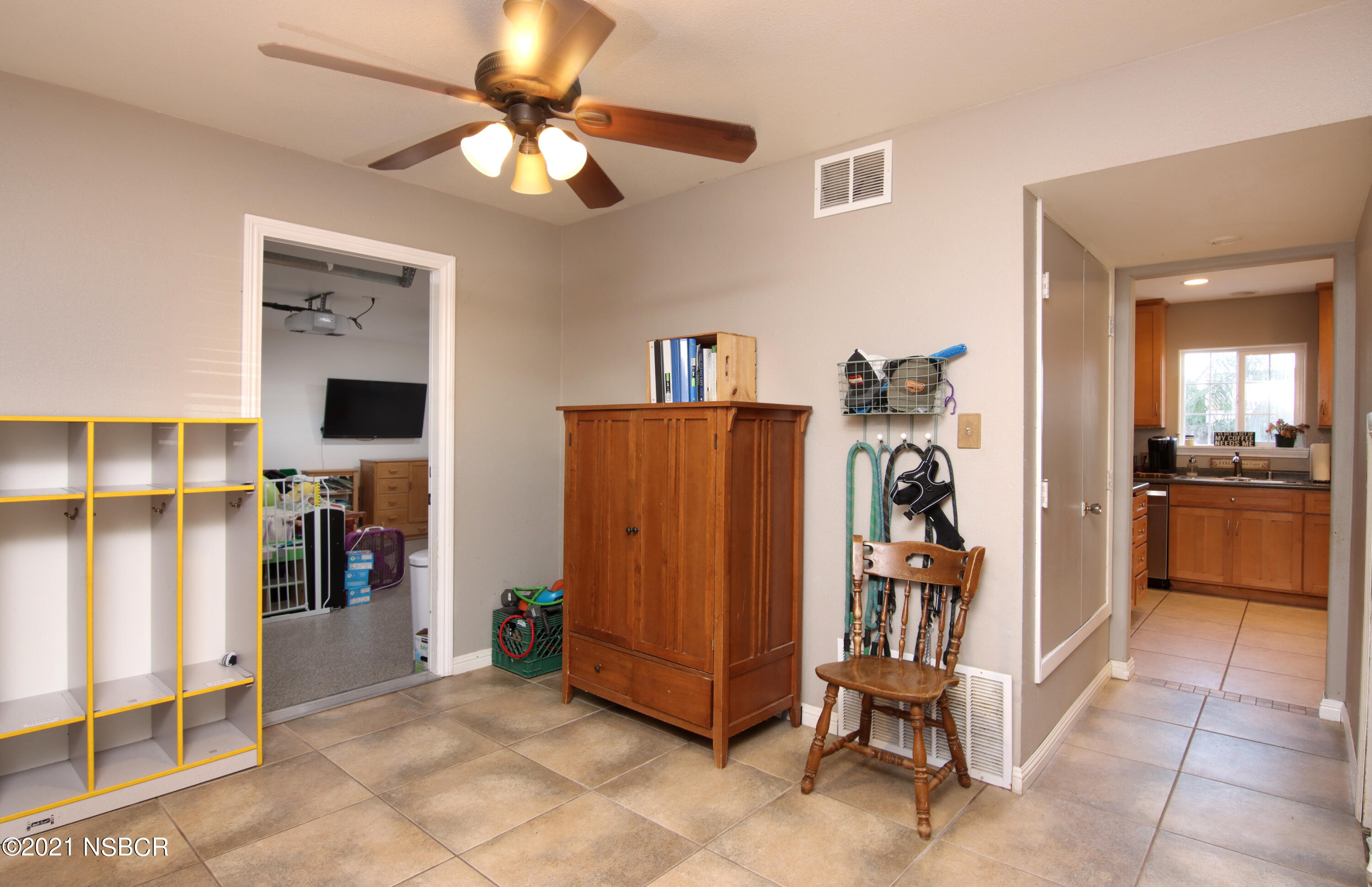 492 Milky Way Lompoc, CA 93436 - Photo 11 of 27 a view of a livingroom with furniture and a kitchen