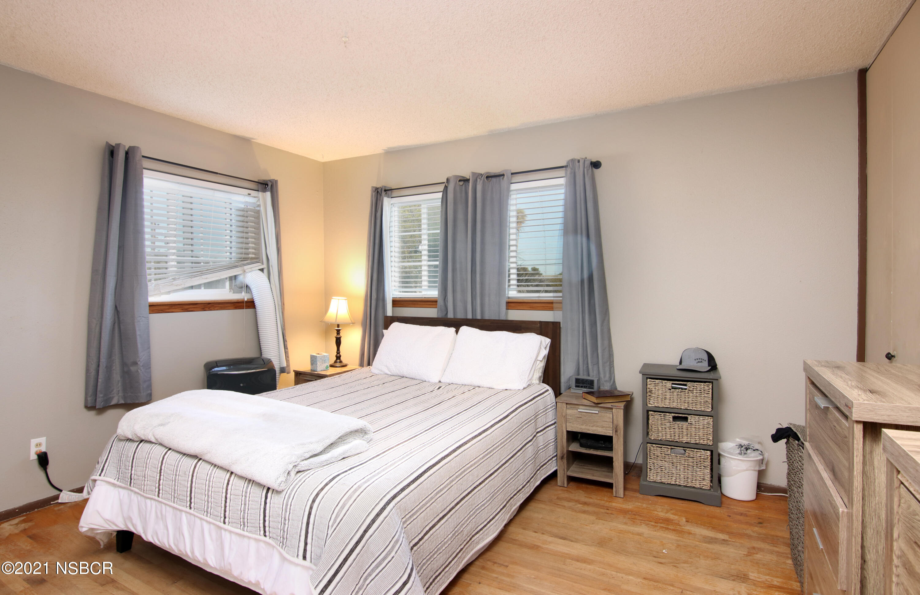 492 Milky Way Lompoc, CA 93436 - Photo 13 of 27 a bedroom with a bed and a tv on the dresser