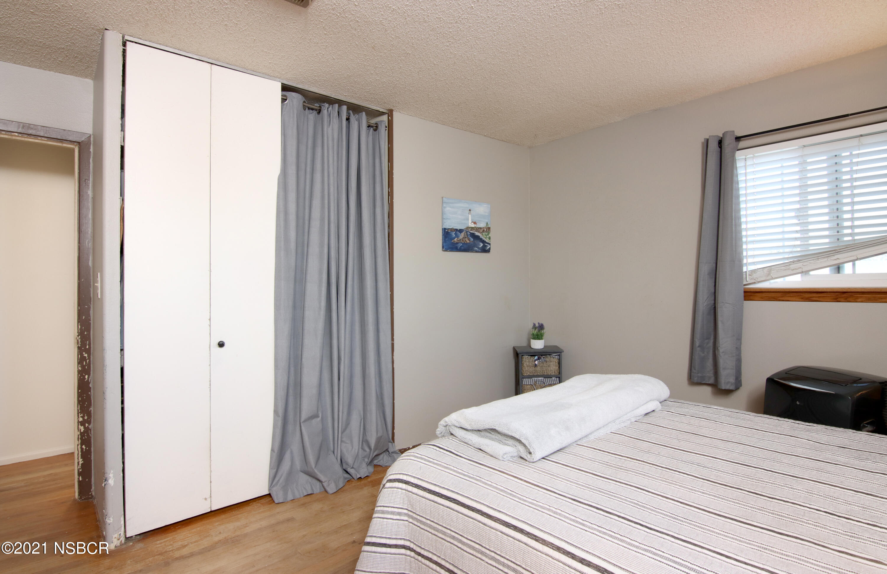 492 Milky Way Lompoc, CA 93436 - Photo 14 of 27 a bedroom with a bed and a window