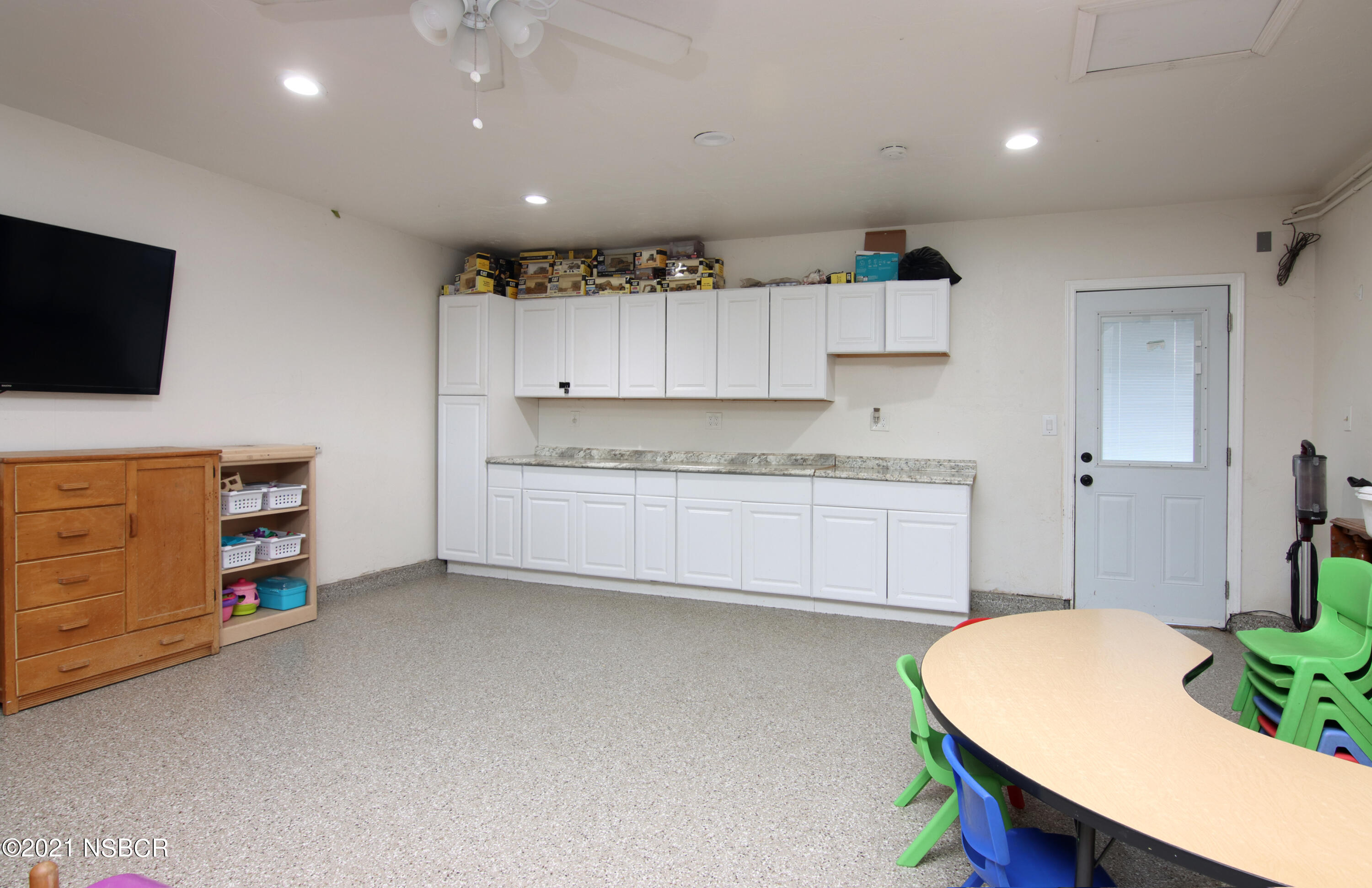 492 Milky Way Lompoc, CA 93436 - Photo 21 of 27 a kitchen with a sink cabinets and wooden floor