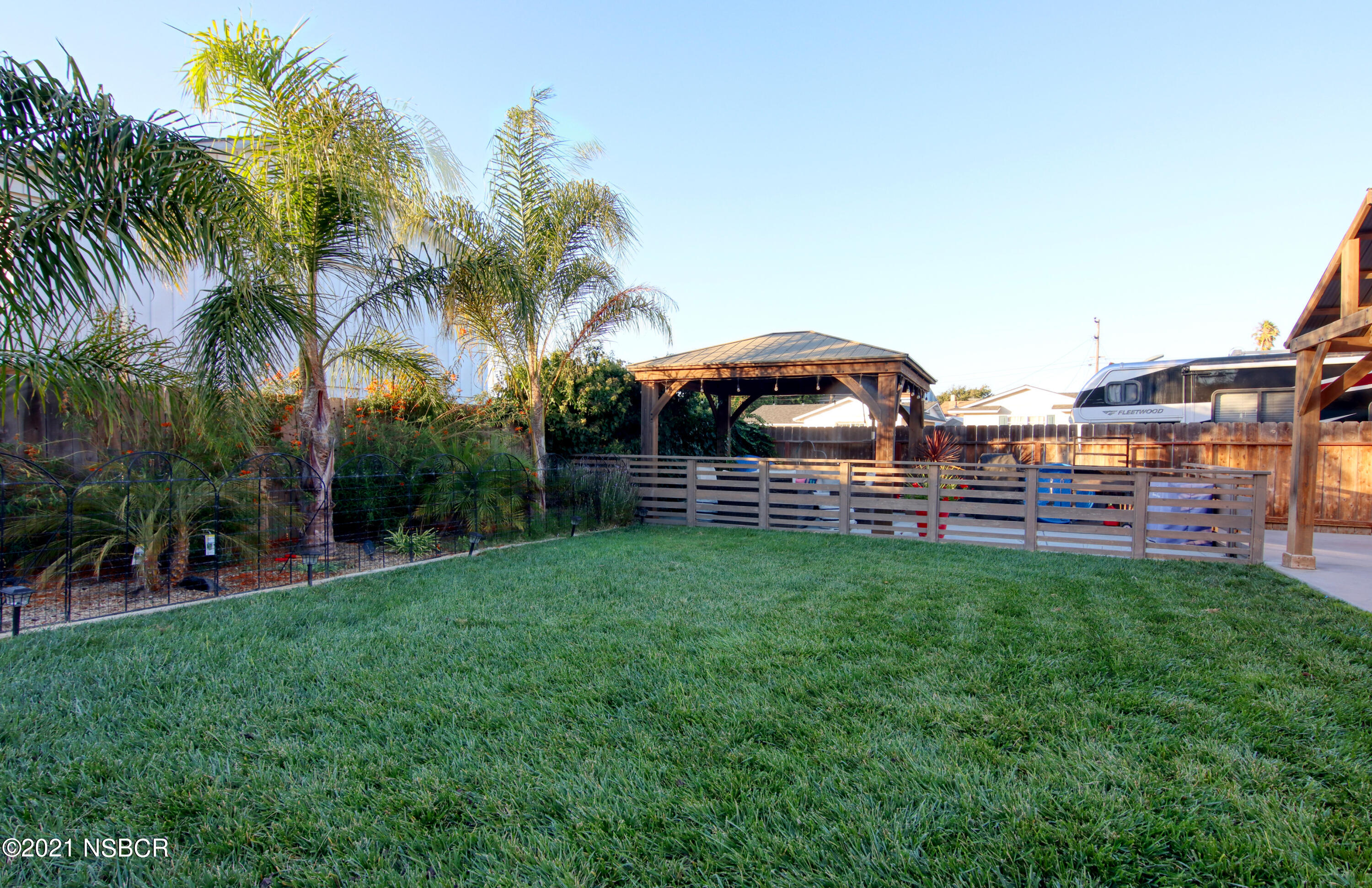 492 Milky Way Lompoc, CA 93436 - Photo 24 of 27 a view of a garden with a house