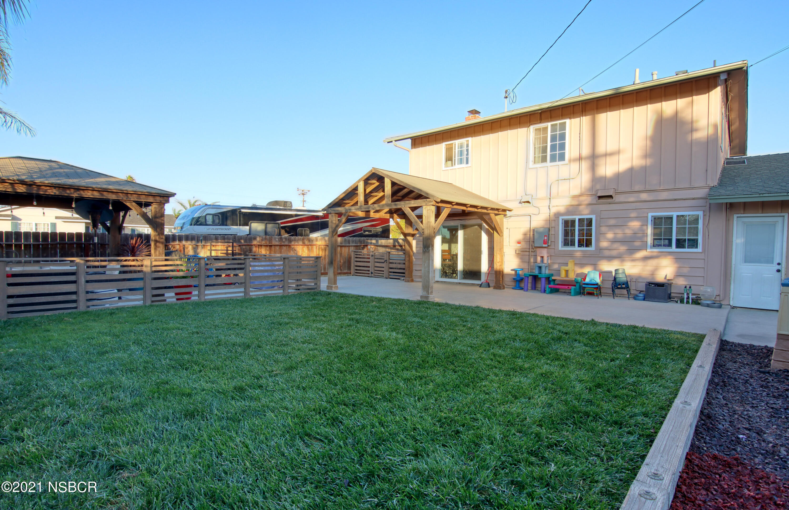 492 Milky Way Lompoc, CA 93436 - Photo 25 of 27 a view of a house with backyard and porch