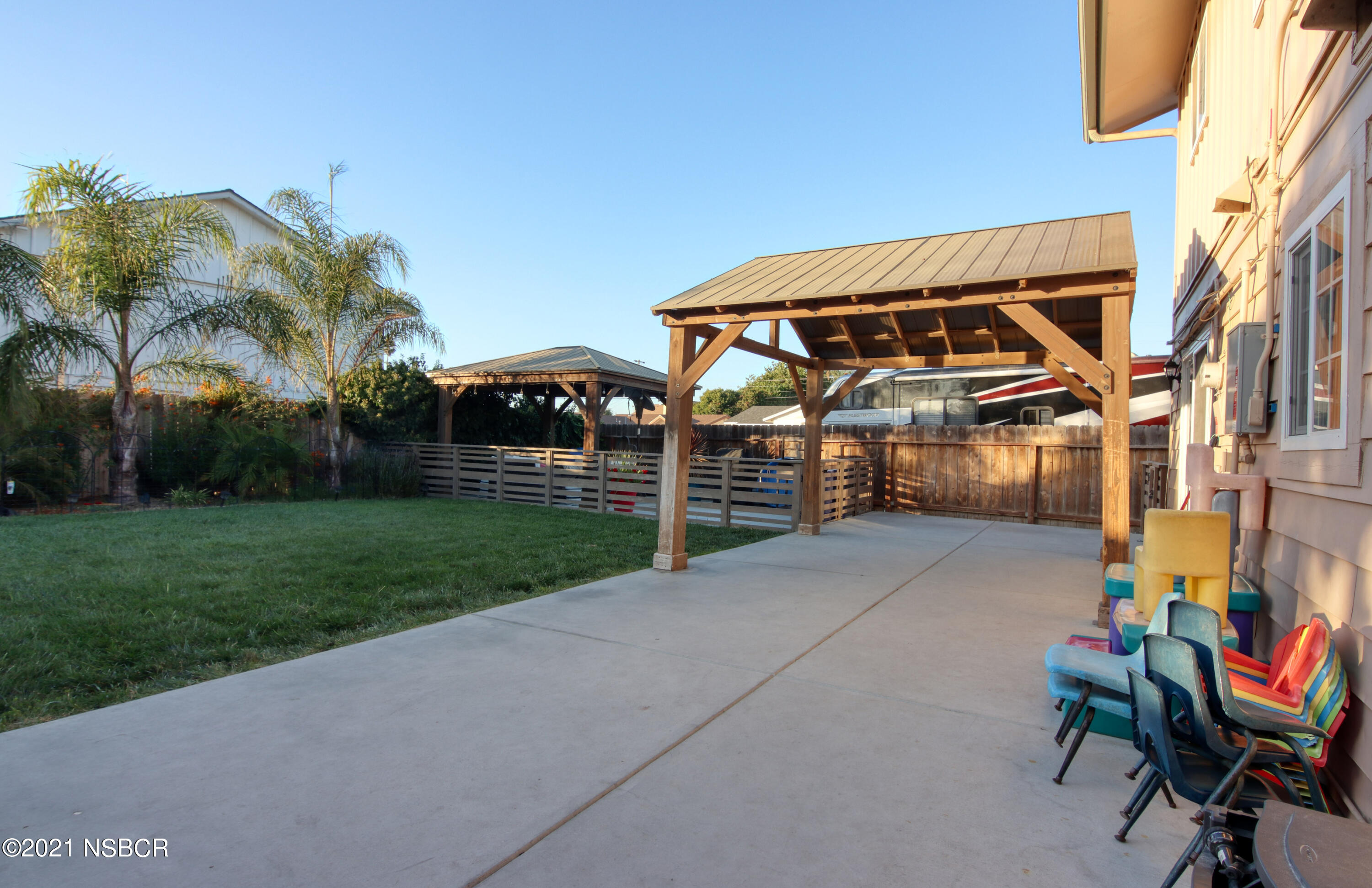 492 Milky Way Lompoc, CA 93436 - Photo 27 of 27 a view of a backyard with sitting area