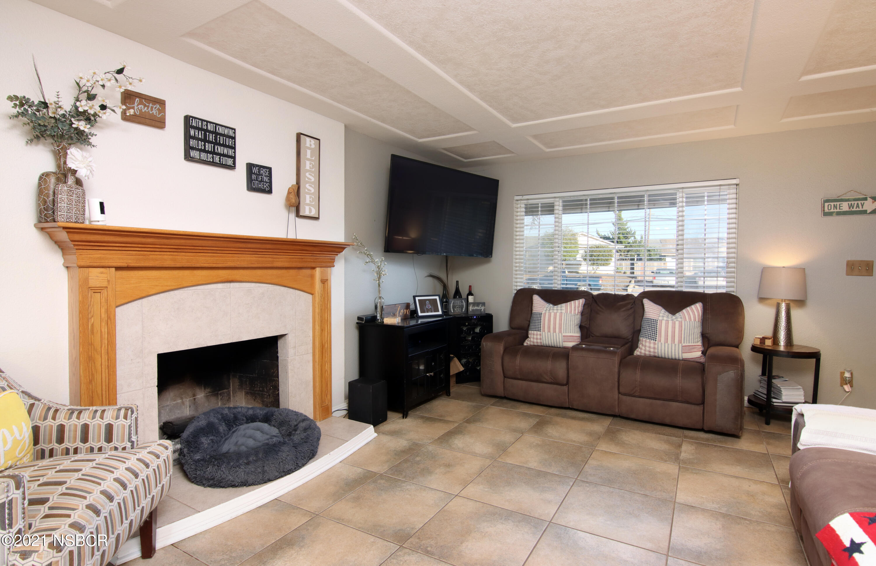492 Milky Way Lompoc, CA 93436 - Photo 5 of 27 a living room with furniture and a fireplace