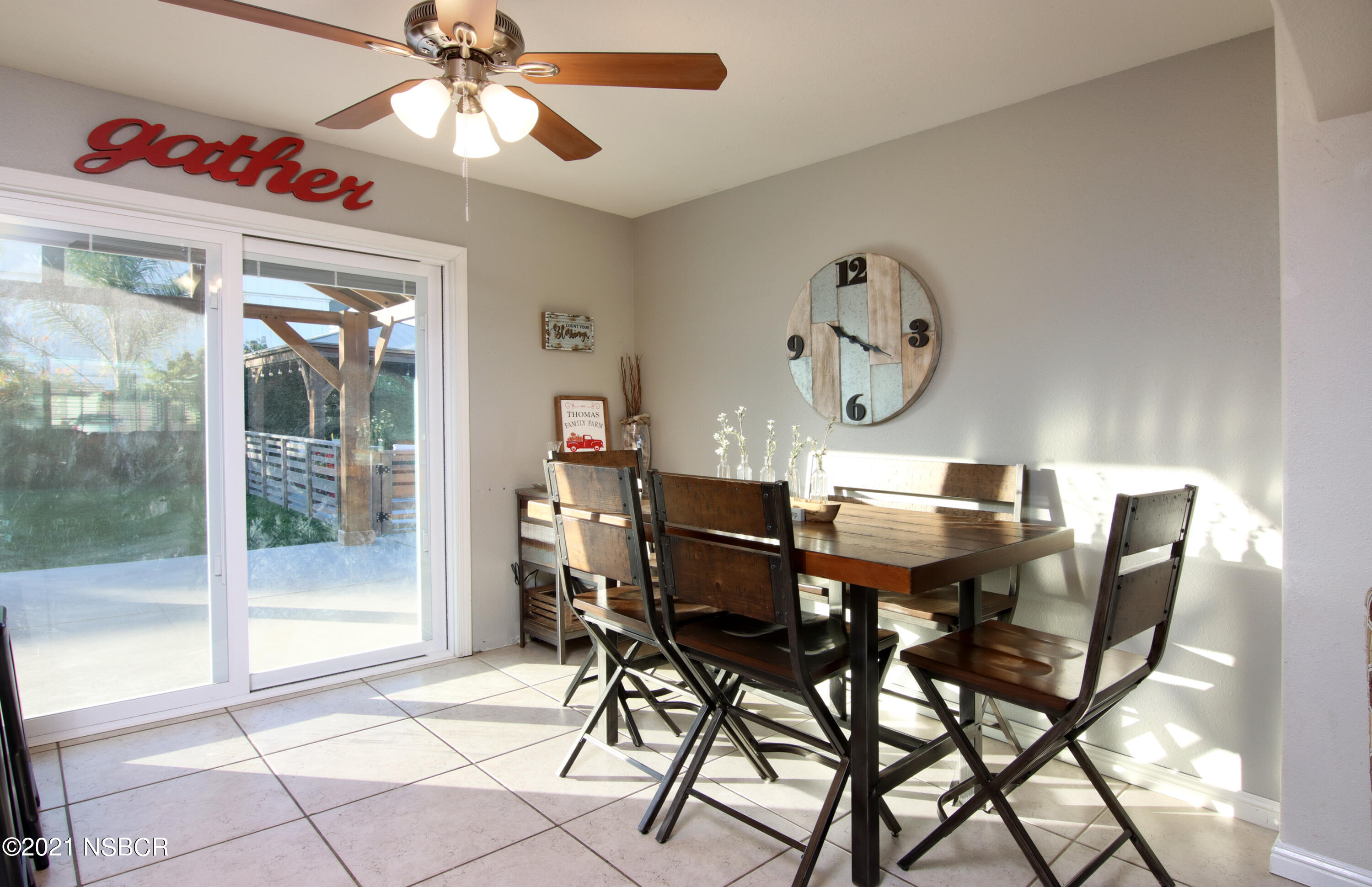 492 Milky Way Lompoc, CA 93436 - Photo 7 of 27 a view of a dining room with furniture and a chandelier