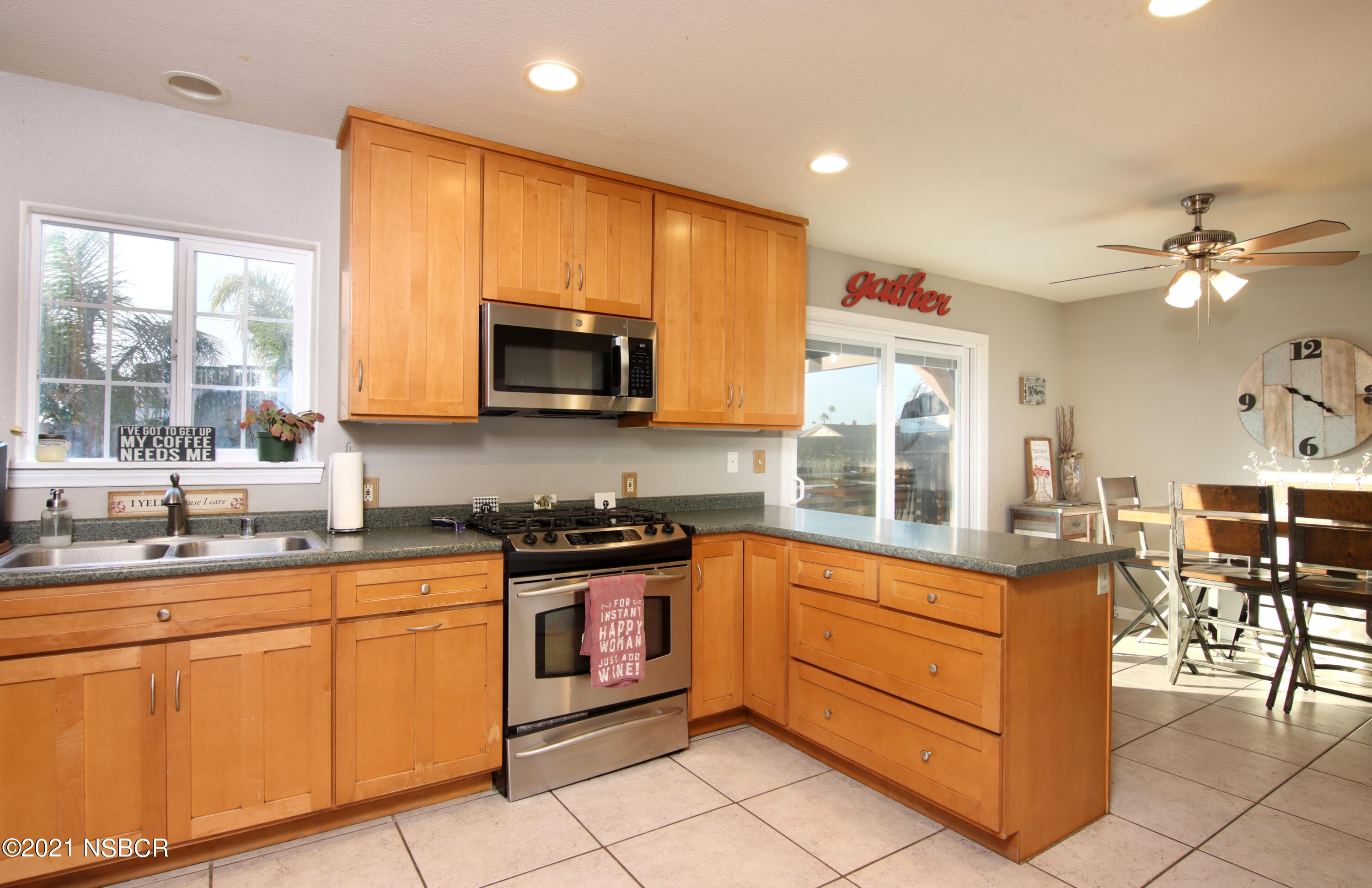 492 Milky Way Lompoc, CA 93436 - Photo 10 of 27 a kitchen with stainless steel appliances granite countertop a sink and cabinets