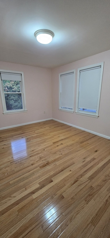 403 South Main Street, Unit 1 Sharon, MA 02067 - Photo 8 of 16 wooden floor in an empty room