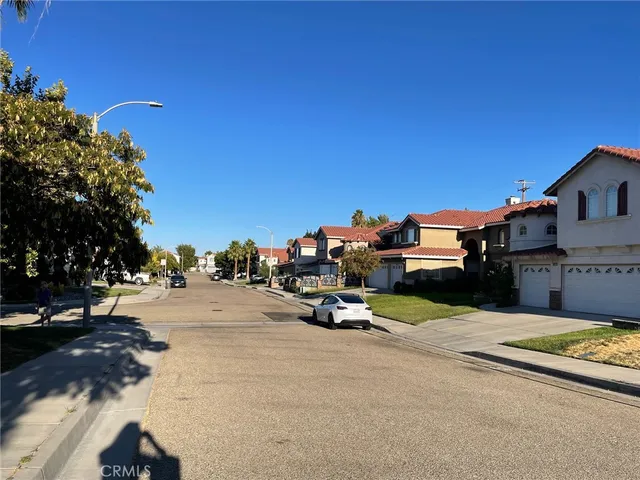 a view of a street with houses
