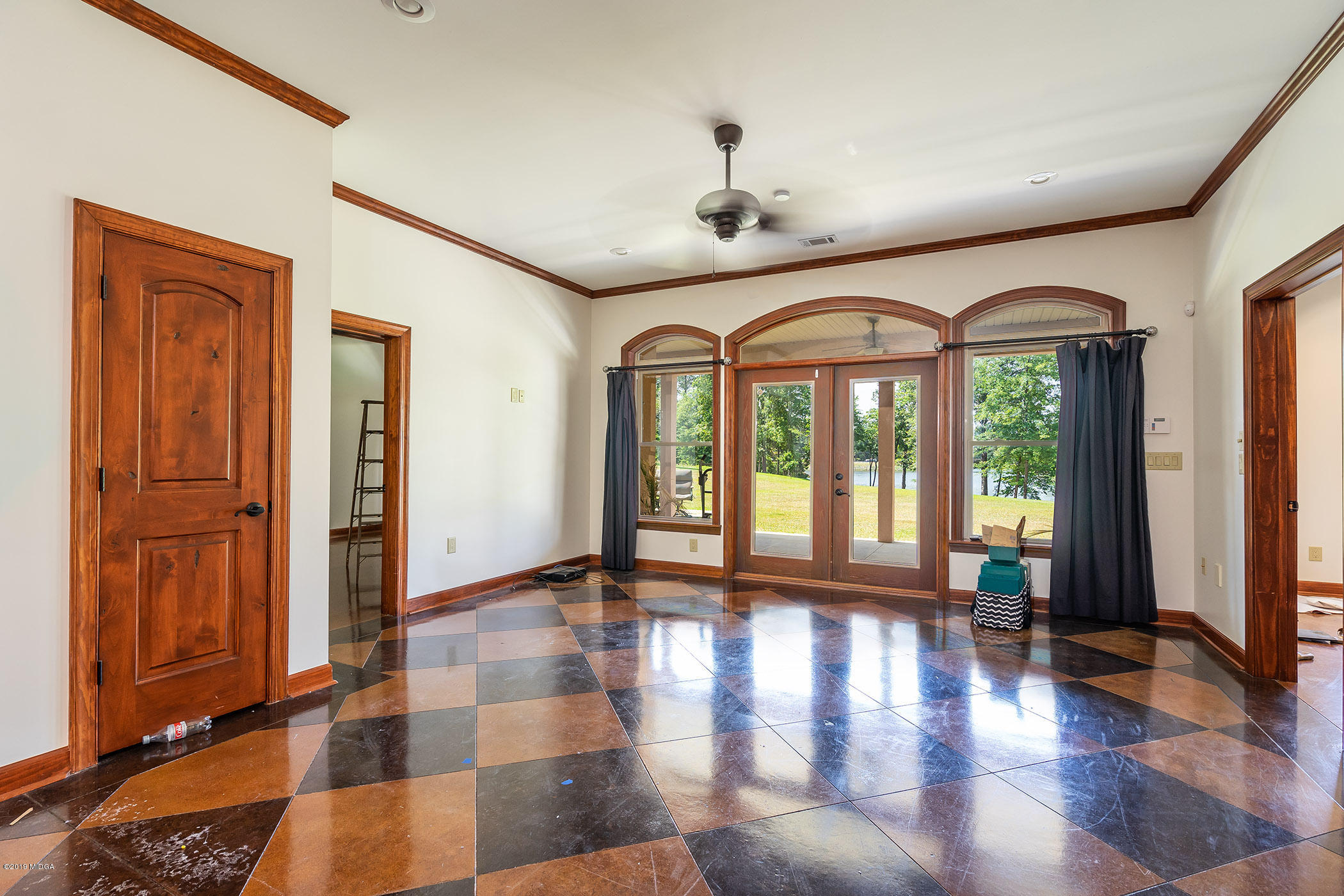 6331 Dobson Road Macon, GA 31220 - Photo 11 of 26 a view of an entryway with wooden floor and door