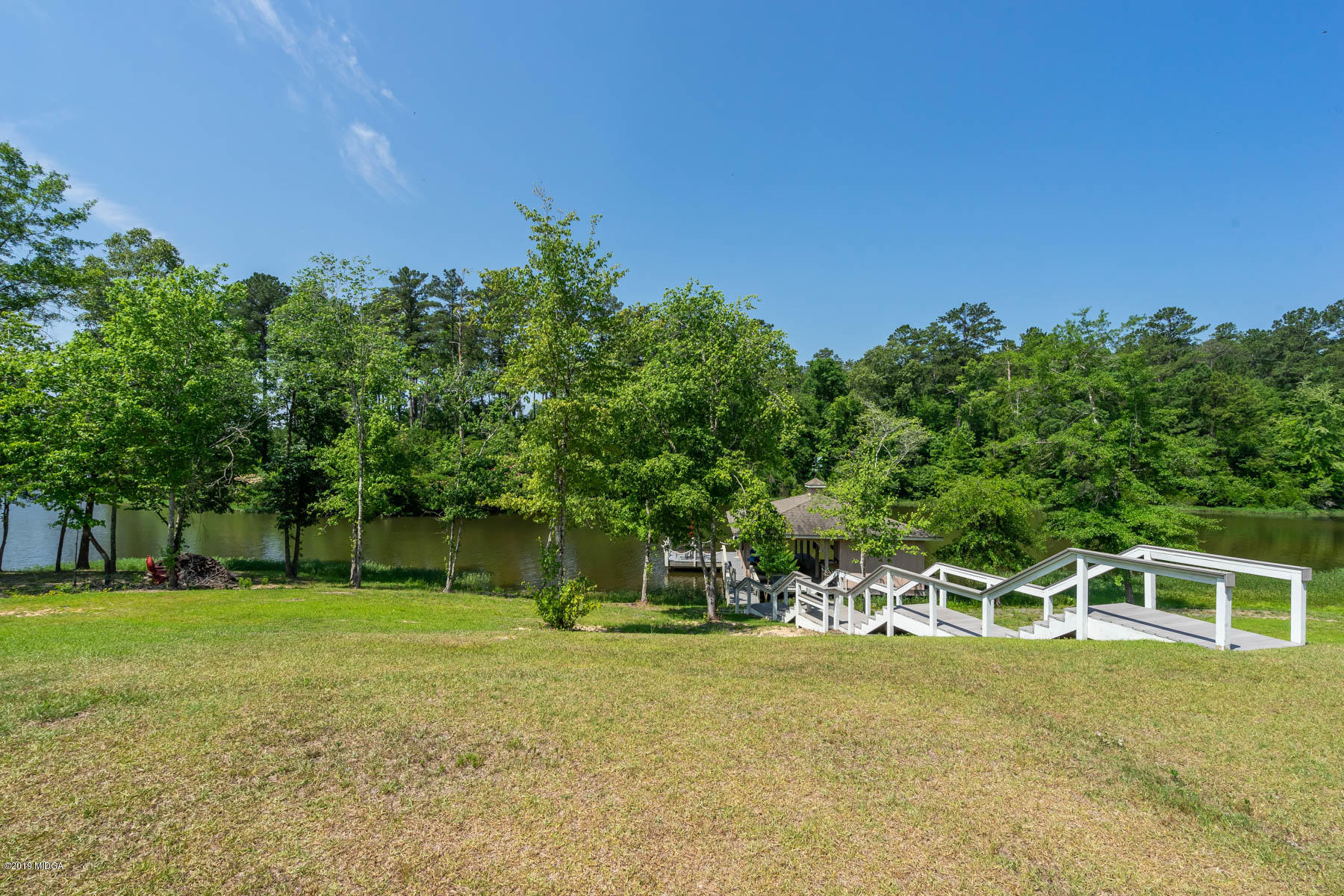 6331 Dobson Road Macon, GA 31220 - Photo 14 of 26 a view of a house with backyard and a tree