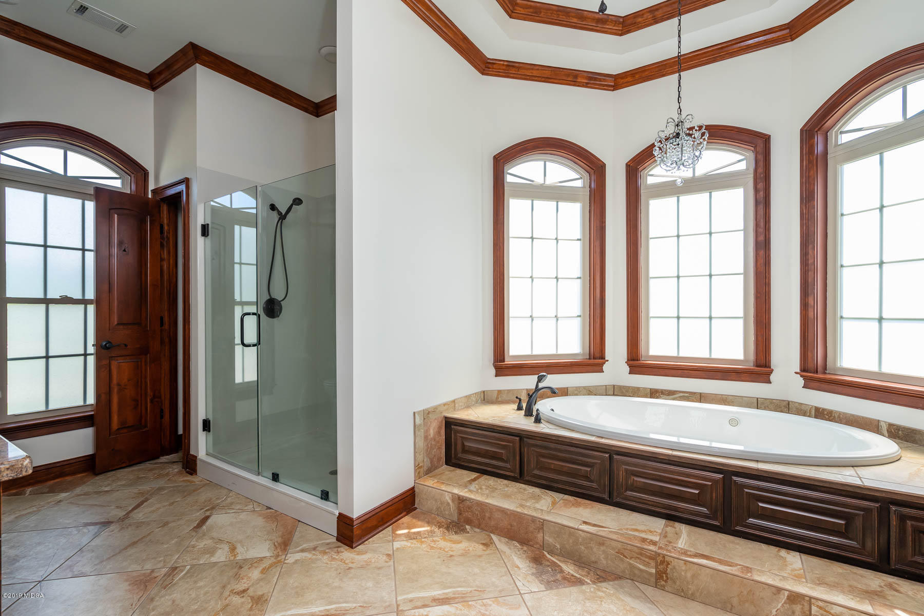 6331 Dobson Road Macon, GA 31220 - Photo 17 of 26 a spacious bathroom with a bathtub and a shower