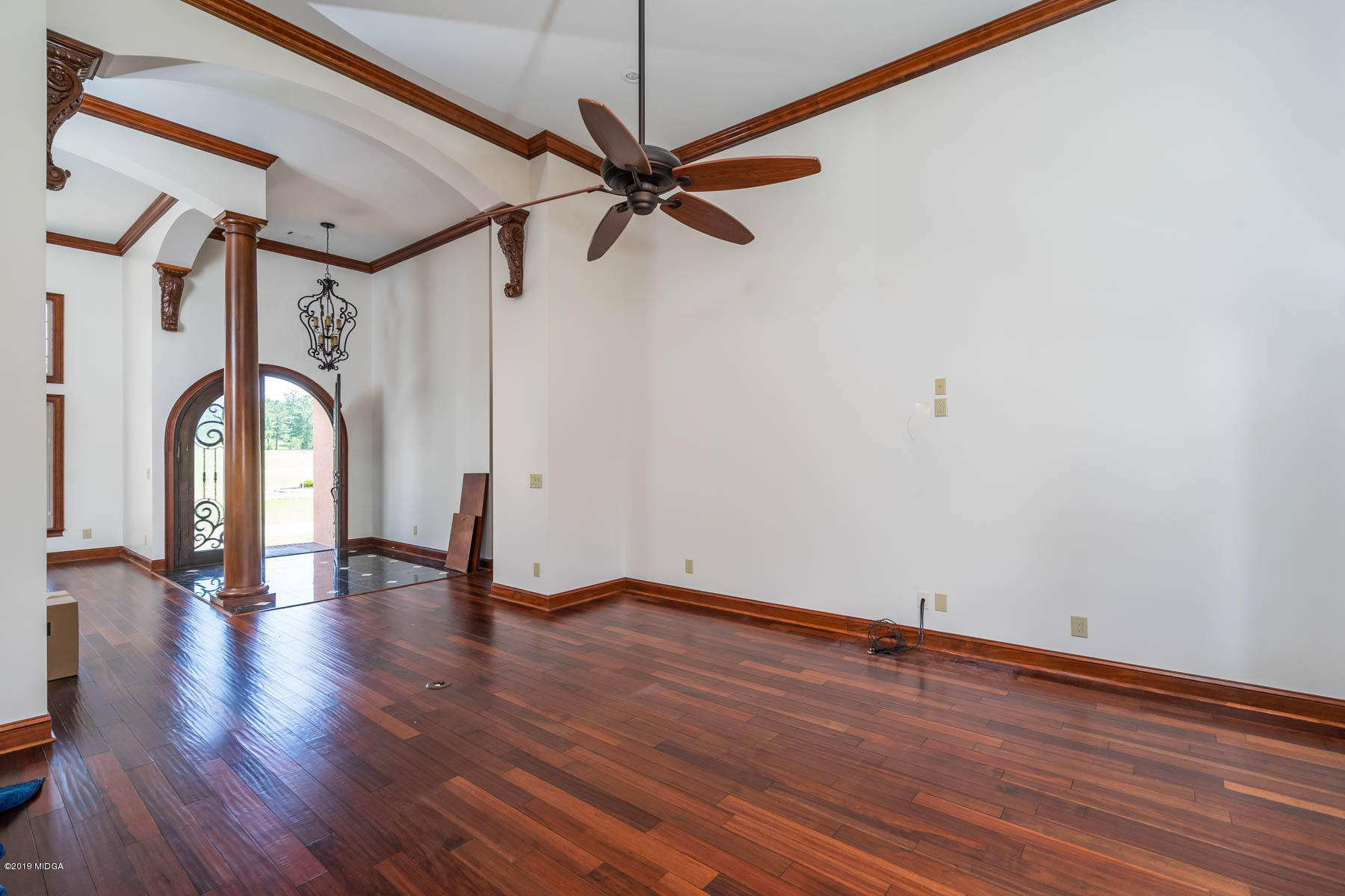 6331 Dobson Road Macon, GA 31220 - Photo 18 of 26 a view of empty room with wooden floor and fan