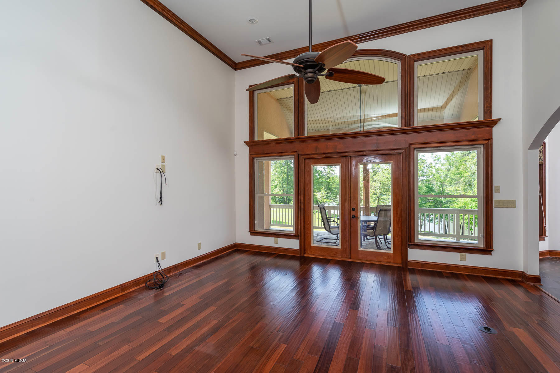 6331 Dobson Road Macon, GA 31220 - Photo 24 of 26 an empty room with wooden floor and windows