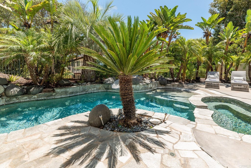 1368 Corvidae Street Carlsbad, CA 92011 - Photo 31 of 38 a view of a garden with a fountain
