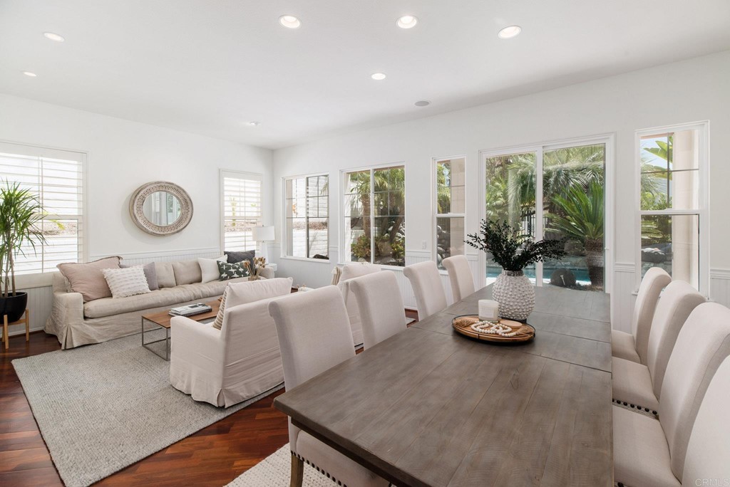 1368 Corvidae Street Carlsbad, CA 92011 - Photo 4 of 38 a living room with furniture and a large window