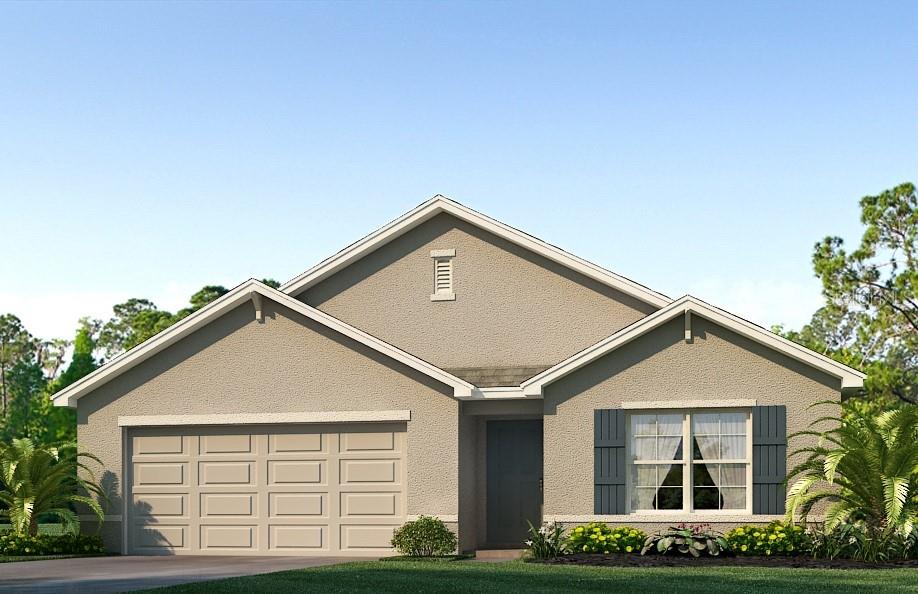2549 Southwest 153rd Pl Road Ocala, FL 34473 - Photo 1 of 1 a front view of a house with garden