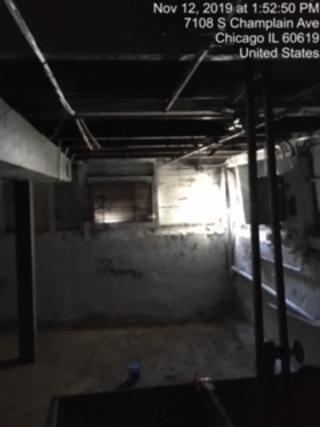7110 South Champlain Avenue Chicago, IL 60619 - Photo 9 of 13 a water heater room
