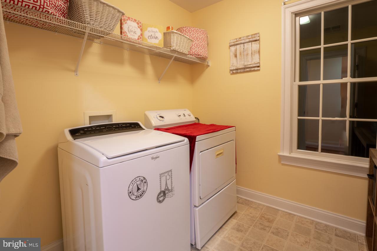 7060 Prout Road Friendship, MD 20758 - Photo 34 of 52 a utility room with dryer and washer