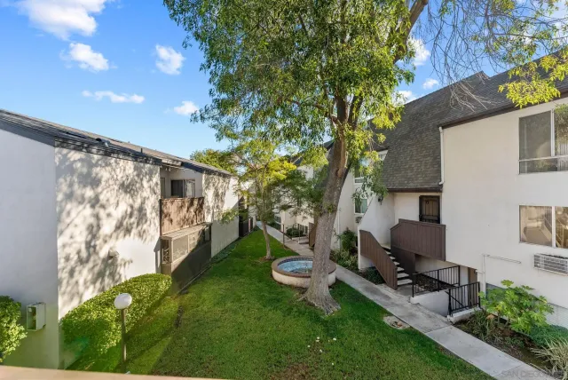 a house view with a backyard space