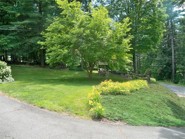 284 Mountain Road Gill, MA 01354 - Photo 26 of 28 a view of a garden with a lake