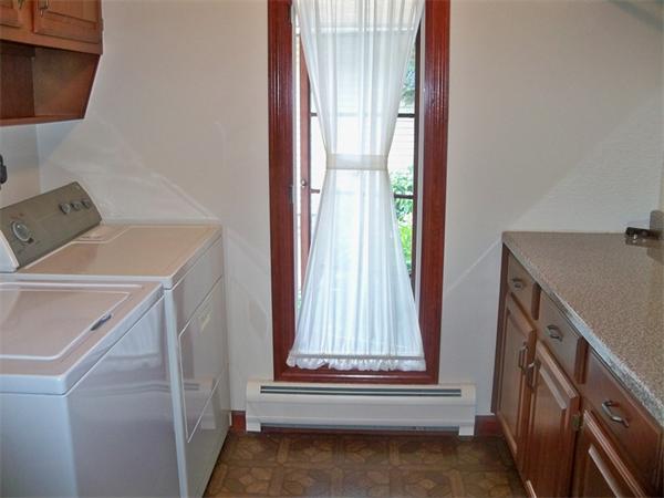 284 Mountain Road Gill, MA 01354 - Photo 9 of 28 a bathroom with a sink and washing machine