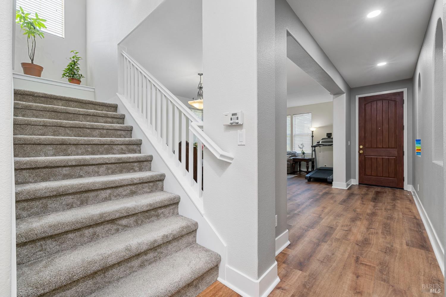 1461-1463 Trombetta Street Santa Rosa, CA 95407 - Photo 12 of 53 a view of entryway and hall with wooden floor