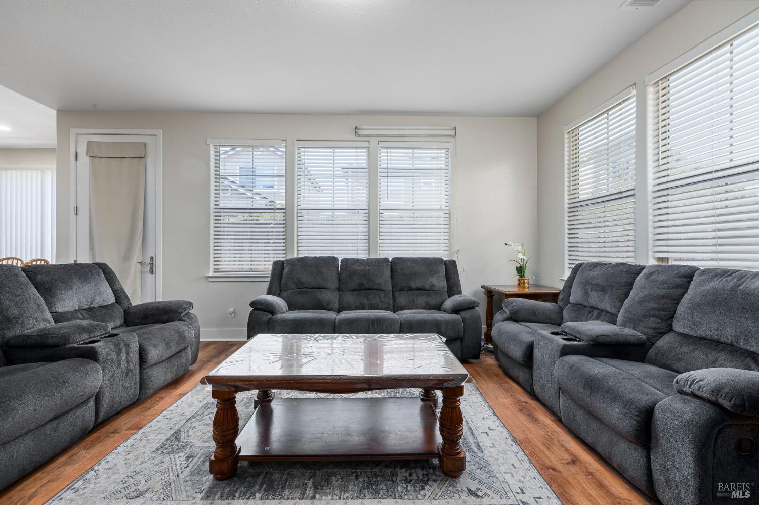1461-1463 Trombetta Street Santa Rosa, CA 95407 - Photo 15 of 53 a living room with furniture and a large window