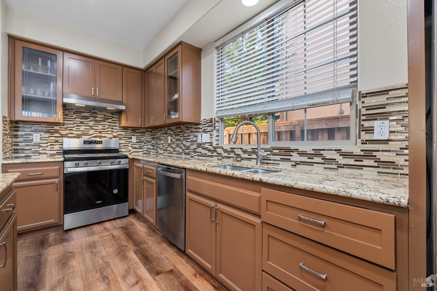 1461-1463 Trombetta Street Santa Rosa, CA 95407 - Photo 22 of 53 a kitchen with sink and cabinets