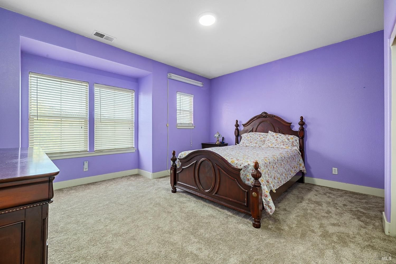 1461-1463 Trombetta Street Santa Rosa, CA 95407 - Photo 28 of 53 a bedroom with a bed and a window