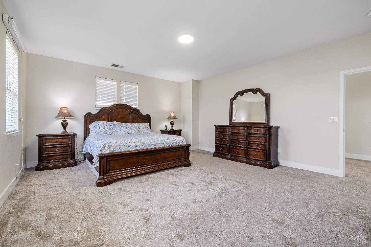 1461-1463 Trombetta Street Santa Rosa, CA 95407 - Photo 31 of 53 a bedroom with a bed and a window