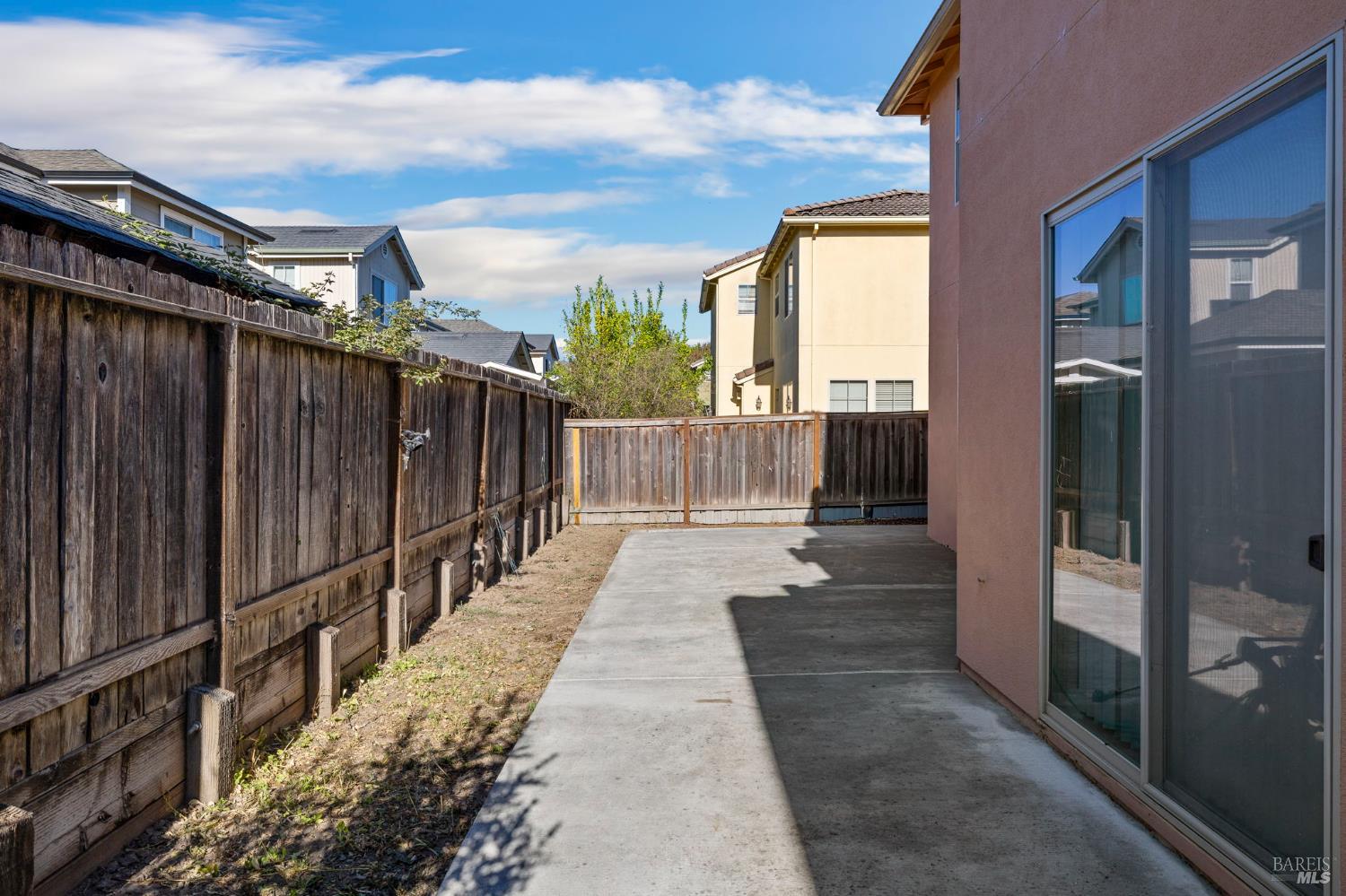 1461-1463 Trombetta Street Santa Rosa, CA 95407 - Photo 47 of 53 a view of a pathway with a wooden fence