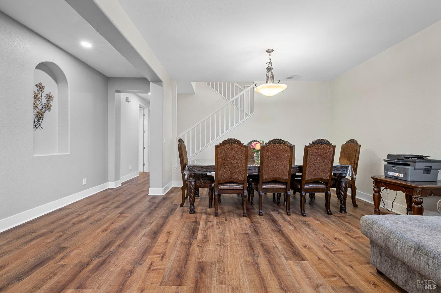 1461-1463 Trombetta Street Santa Rosa, CA 95407 - Photo 8 of 53 a view of a dining room with furniture and wooden floor